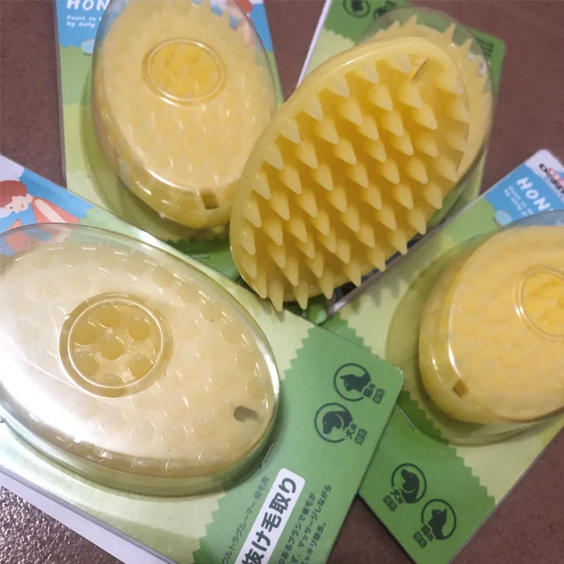 Silicone pet massage brush with soft bristles for gentle grooming and hair removal